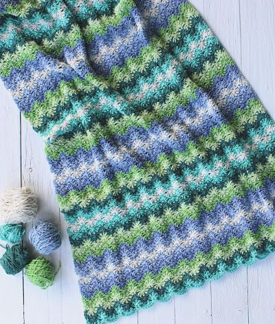 Beautiful crocheted Ric Rac Blanket pattern in Water's Edge colours